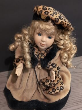Porcelain Doll in Leopard Trim Camel Velvet Dress